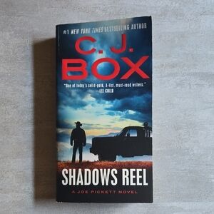 Shadows Reel By C.J. Box Paperback Novel Mystery Crime Fictional Book
